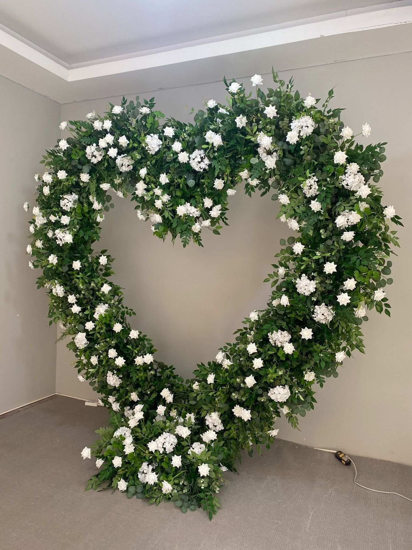 Foliage With White Florals Freestanding Heart With Stand
